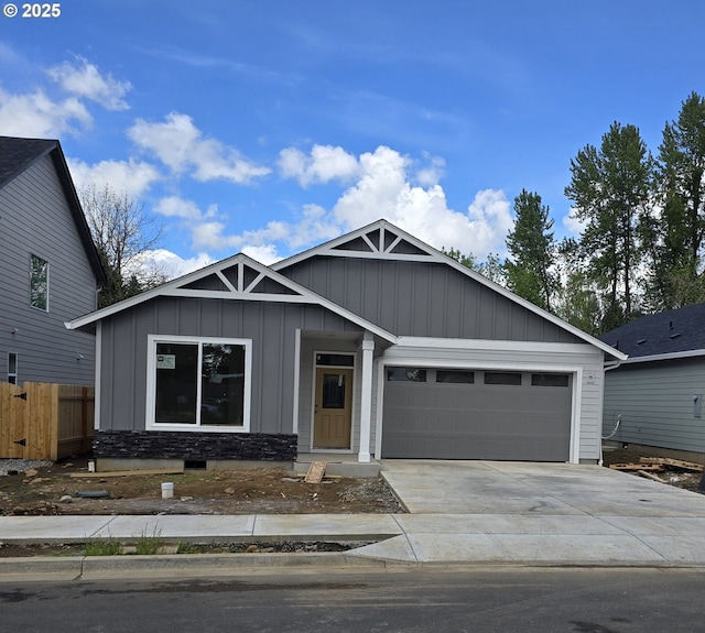 12812 NE 109th St, Vancouver, WA 98682 - craftsman inspired home featuring concrete driveway, fence, board and batten siding, and an attached garage