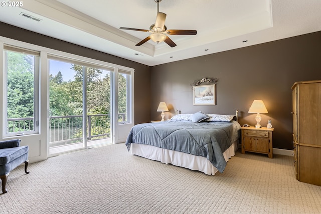31235 SW Willamette Way, Wilsonville, OR 97070 - bedroom featuring a tray ceiling, light carpet, access to outside, and ceiling fan