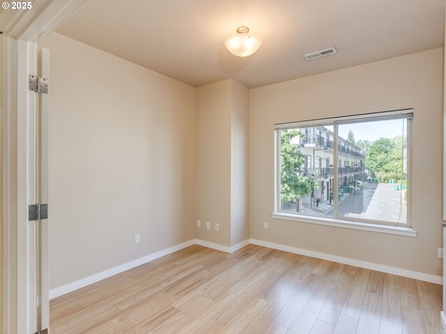 10442 SW Akilean Ter, Portland, OR 97223 - unfurnished room featuring light wood finished floors and baseboards