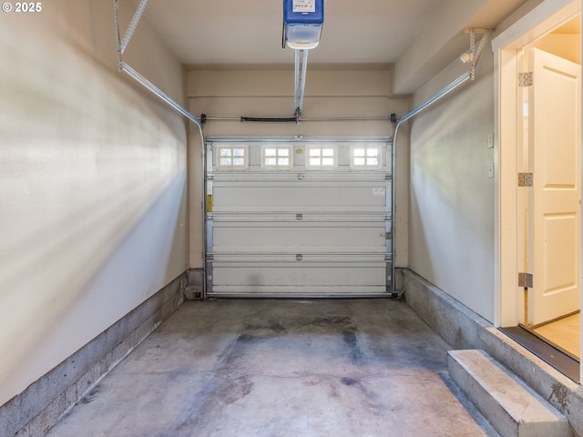 10442 SW Akilean Ter, Portland, OR 97223 - garage featuring a garage door opener