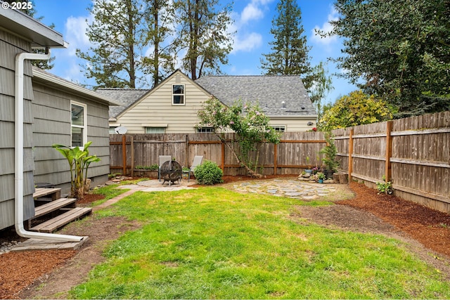 view of yard featuring a fenced backyard and a patio area