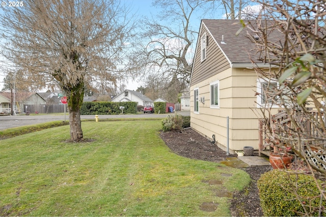 view of yard featuring a residential view