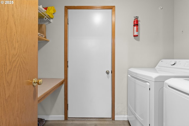 15302 NE 88th St, Vancouver, WA 98682 - laundry room featuring washing machine and dryer and wood finished floors