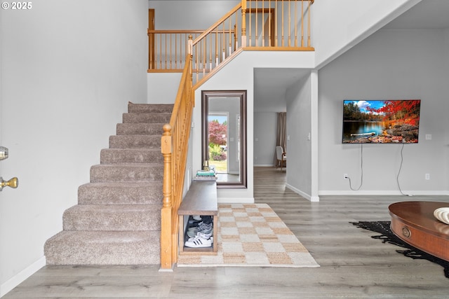 15302 NE 88th St, Vancouver, WA 98682 - staircase featuring wood finished floors and a high ceiling