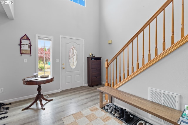 15302 NE 88th St, Vancouver, WA 98682 - foyer featuring stairs, a towering ceiling, and wood finished floors