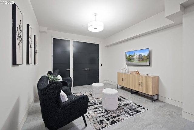 living area with baseboards