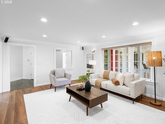 8920 SW 9th Dr, Portland, OR 97219 - living room featuring ornamental molding, wood finished floors, baseboards, and recessed lighting