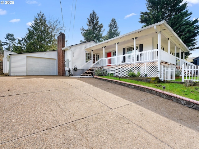 8920 SW 9th Dr, Portland, OR 97219 - view of front facade featuring a porch, driveway, an outbuilding, and a chimney