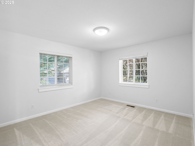 8920 SW 9th Dr, Portland, OR 97219 - empty room with light colored carpet and baseboards