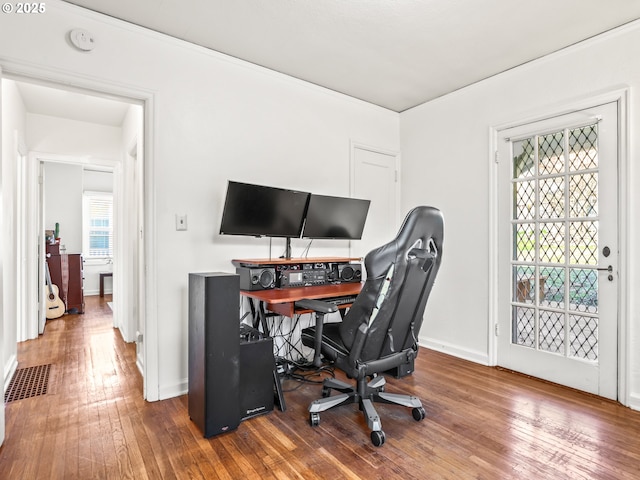 home office featuring hardwood / wood-style flooring