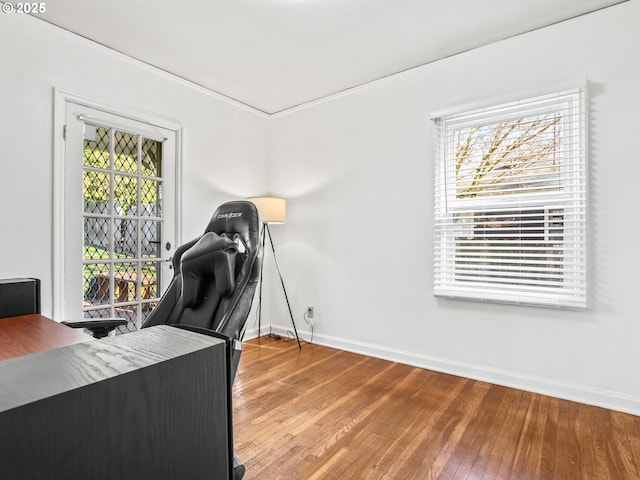 unfurnished office featuring hardwood / wood-style flooring