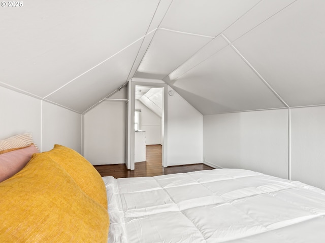 bedroom with vaulted ceiling