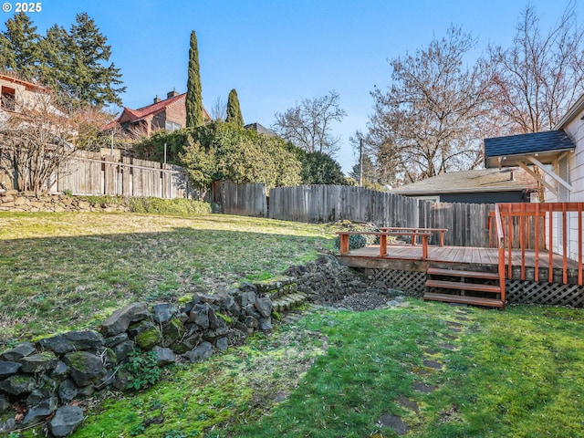 view of yard with a wooden deck