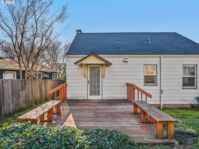 rear view of property with a deck