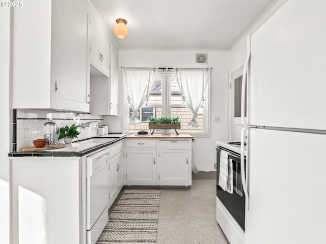 kitchen featuring sink, white cabinetry, tile countertops, white appliances, and backsplash