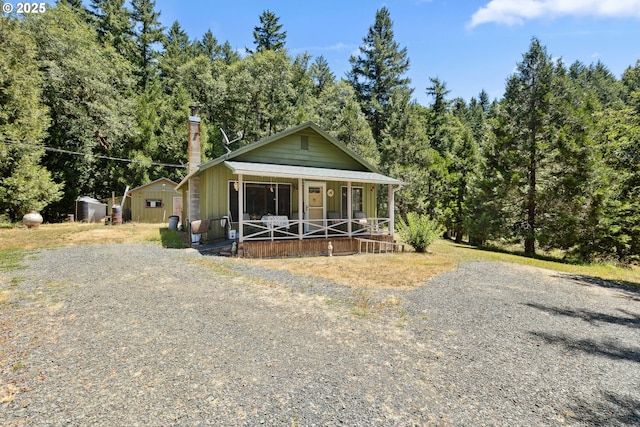 7291 Rice Valley Rd, Oakland, OR 97462 - view of front of house with a porch and a chimney