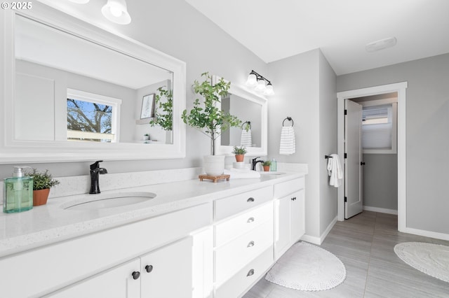 bathroom featuring vanity and tile patterned flooring