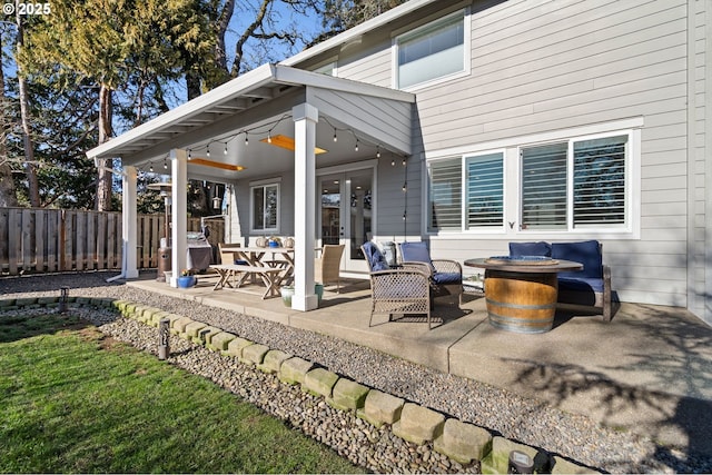 view of patio featuring an outdoor fire pit