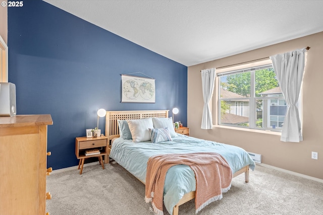 4728 W Powell Blvd Unit 231, Gresham, OR 97030 - bedroom featuring lofted ceiling, carpet flooring, and baseboards