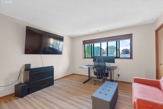 13802 NW 10th Ct, Vancouver, WA 98685 - office space with visible vents, baseboards, wood finished floors, and a textured ceiling