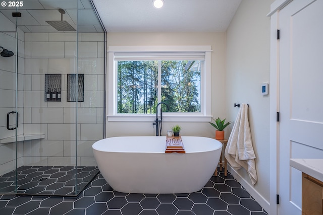 8751 SW 194th Pl, Beaverton, OR 97007 - bathroom with a stall shower, a soaking tub, and tile patterned flooring