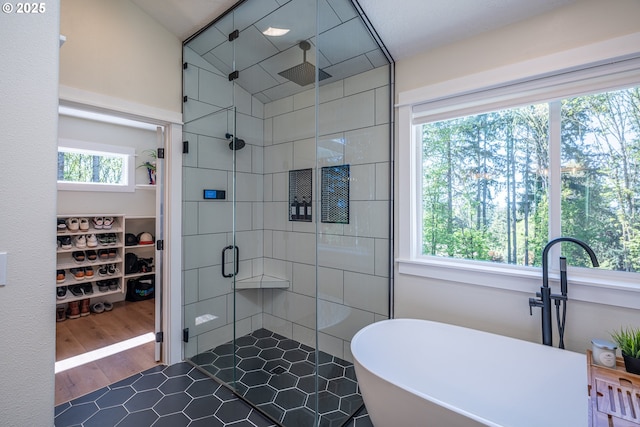 8751 SW 194th Pl, Beaverton, OR 97007 - full bathroom with a shower stall, a soaking tub, plenty of natural light, and a walk in closet