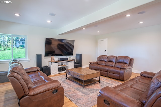 8751 SW 194th Pl, Beaverton, OR 97007 - living room featuring recessed lighting, light wood-type flooring, and beam ceiling