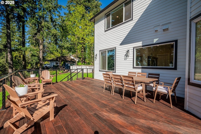 8751 SW 194th Pl, Beaverton, OR 97007 - wooden deck featuring outdoor dining area