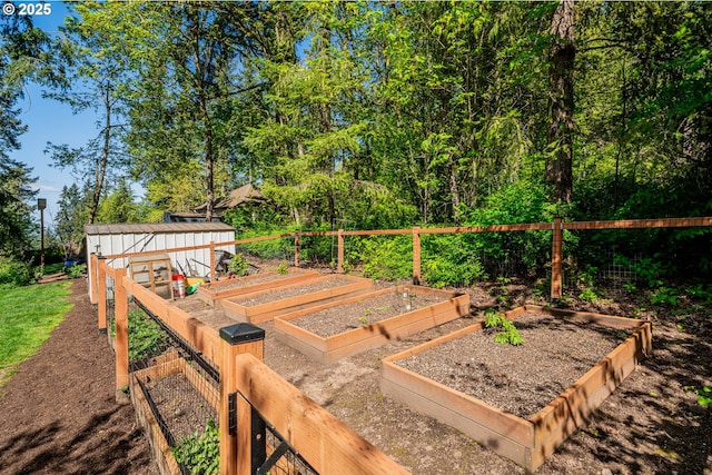 8751 SW 194th Pl, Beaverton, OR 97007 - wooden deck featuring a vegetable garden