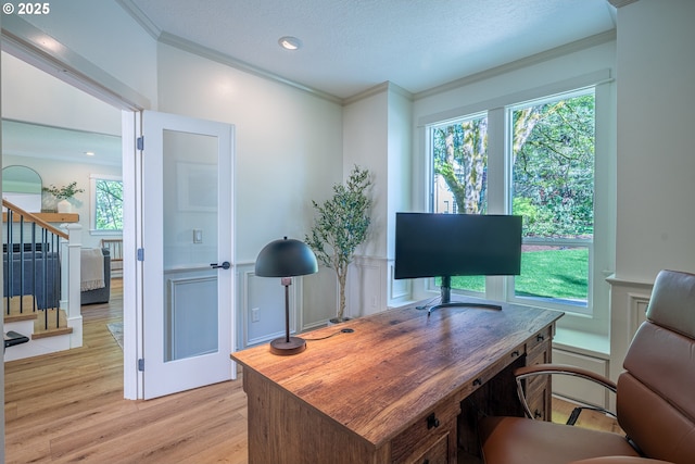 8751 SW 194th Pl, Beaverton, OR 97007 - office area featuring light wood finished floors, ornamental molding, wainscoting, and a textured ceiling
