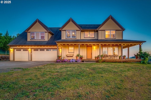 view of front of home featuring a porch, an attached garage, board and batten siding, driveway, and a front lawn