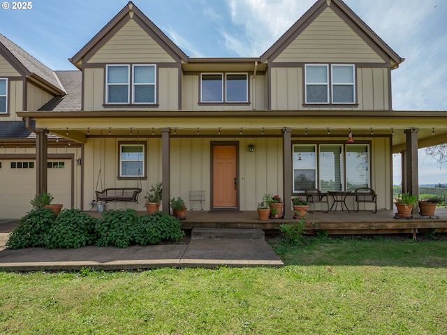view of front facade featuring covered porch, board and batten siding, and a front lawn