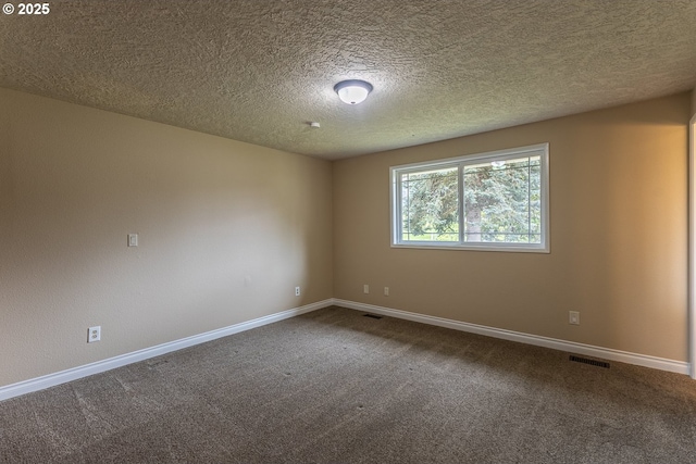3026 NW Norwood St, Camas, WA 98607 - carpeted empty room featuring baseboards and a textured ceiling