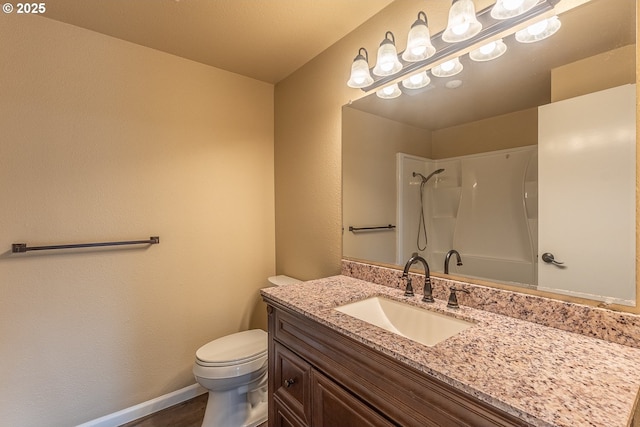 3026 NW Norwood St, Camas, WA 98607 - bathroom with toilet, vanity, a shower, and baseboards