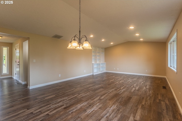 3026 NW Norwood St, Camas, WA 98607 - unfurnished room featuring dark wood-style flooring, a chandelier, lofted ceiling, baseboards, and recessed lighting