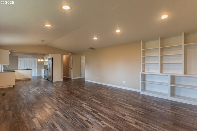 3026 NW Norwood St, Camas, WA 98607 - unfurnished living room featuring a sink, dark wood-style flooring, baseboards, a chandelier, and recessed lighting