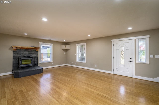 50 W Taylor St, Carlton, OR 97111 - unfurnished living room featuring light wood finished floors, baseboards, and recessed lighting