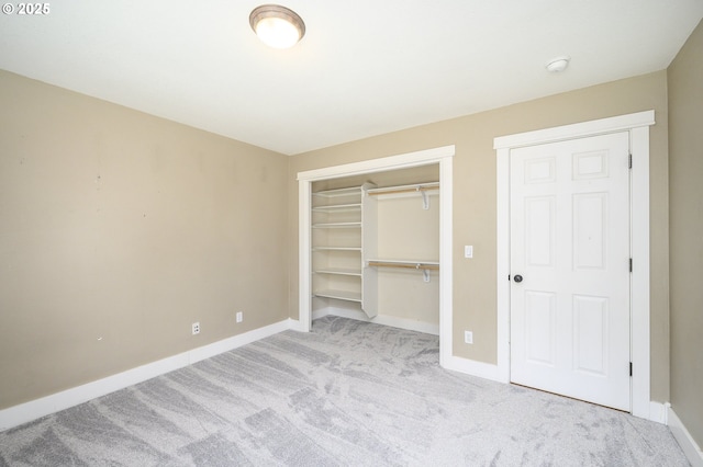 50 W Taylor St, Carlton, OR 97111 - unfurnished bedroom featuring carpet, baseboards, and a closet