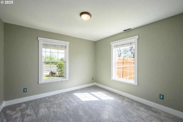 50 W Taylor St, Carlton, OR 97111 - carpeted empty room with baseboards