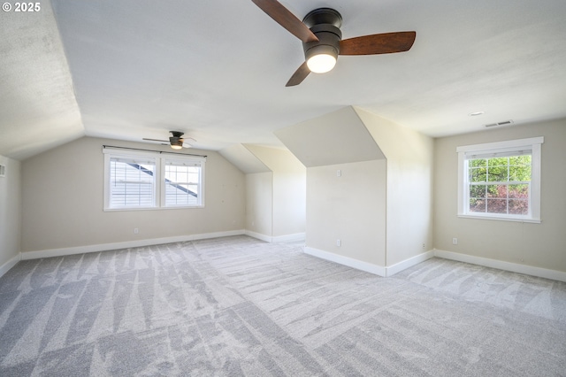 50 W Taylor St, Carlton, OR 97111 - additional living space with light colored carpet, ceiling fan, plenty of natural light, and lofted ceiling