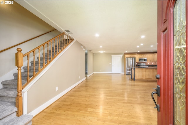 50 W Taylor St, Carlton, OR 97111 - entrance foyer featuring light wood-style floors, recessed lighting, stairway, and baseboards