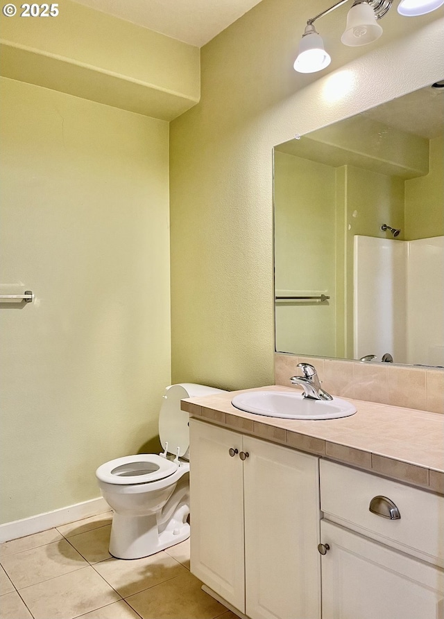 608 NE Roydon Ln, Hillsboro, OR 97006 - full bath with tile patterned flooring, vanity, and a shower