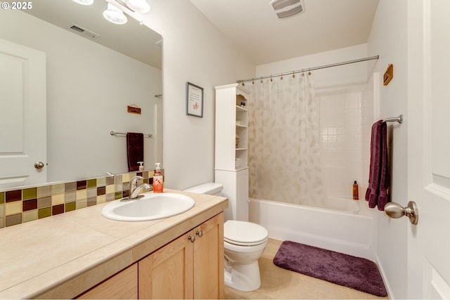 full bathroom with vanity, toilet, and shower / bath combo