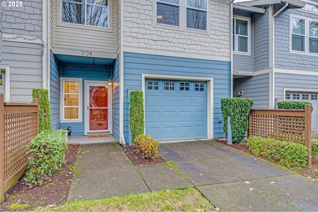 property entrance with a garage