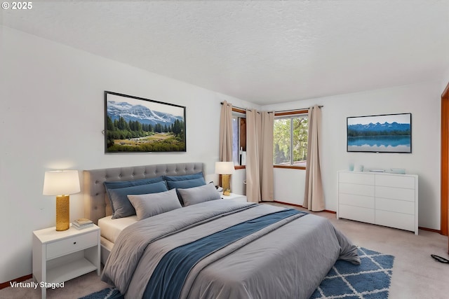 bedroom featuring carpet floors and baseboards