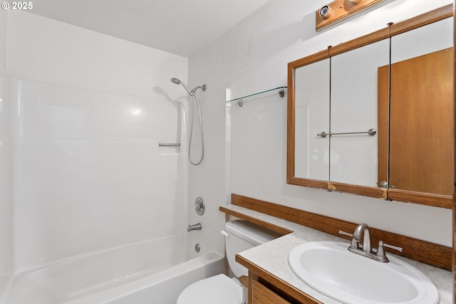 full bath featuring toilet, vanity, and  shower combination
