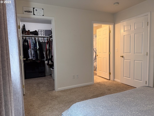 3000 Elm St, Baker City, OR 97814 - carpeted bedroom featuring a closet, a walk in closet, and baseboards