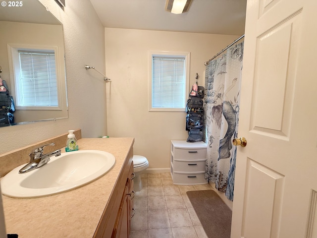 3000 Elm St, Baker City, OR 97814 - full bath with vanity, toilet, tile patterned floors, a shower with shower curtain, and baseboards