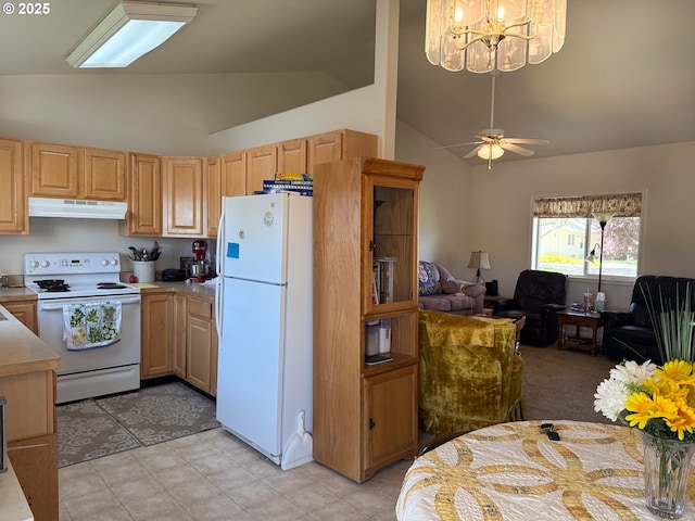 3000 Elm St, Baker City, OR 97814 - kitchen with white appliances, under cabinet range hood, open floor plan, a chandelier, and light countertops