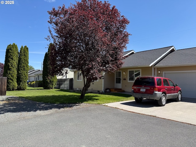 3000 Elm St, Baker City, OR 97814 - view of front of house with a garage, driveway, and a shingled roof